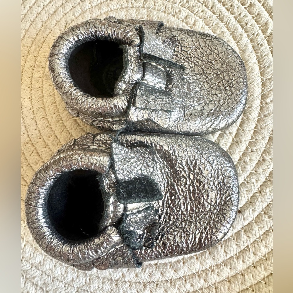 Freshly picked metallic silver mocs newborn